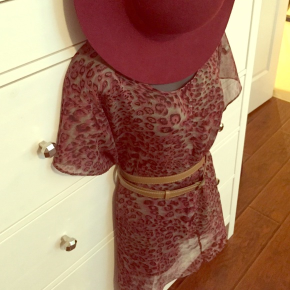 Flowy see thru cheetah pattern top. Very versatile