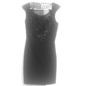 Black mini dress w/ sequin front. Cap sleeve