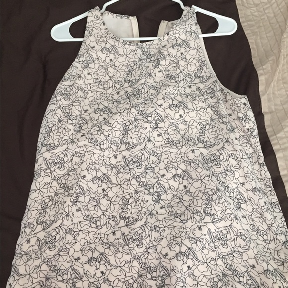 Cream with black flowers top