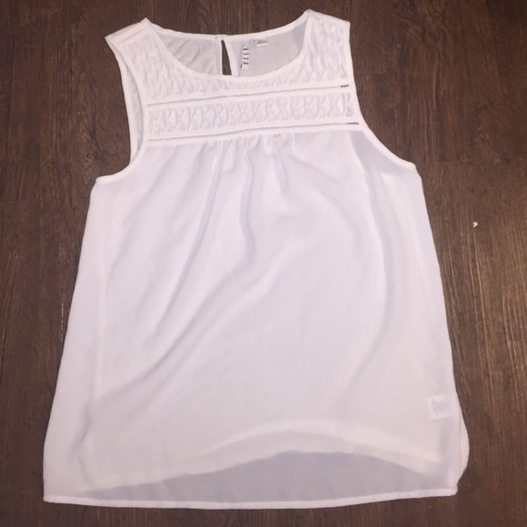 White sleeveless blouse