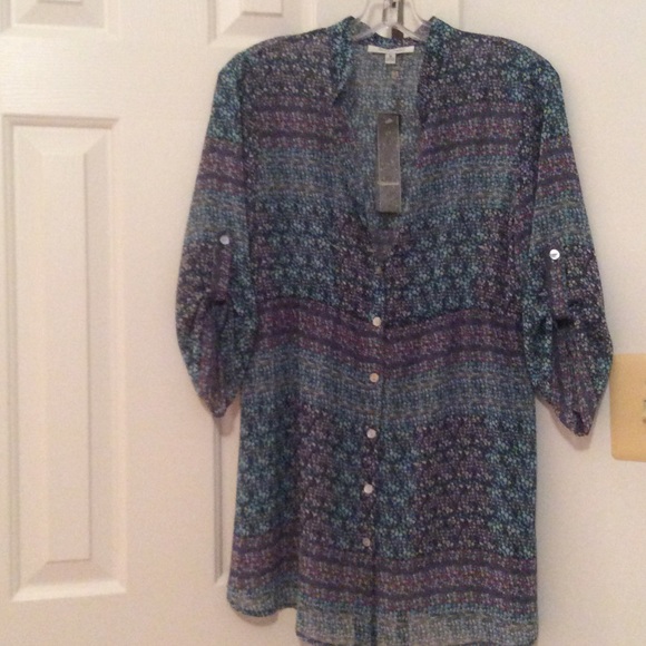 3/4 sleeve floral blouse.