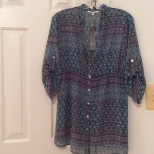 3/4 sleeve floral blouse.