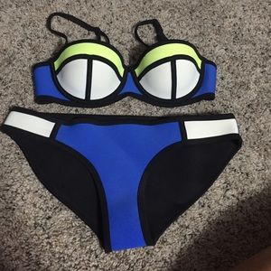 Authentic Triangl Suit