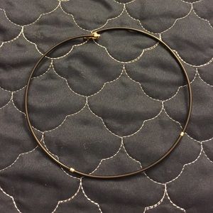 Black rubber necklace with gold details