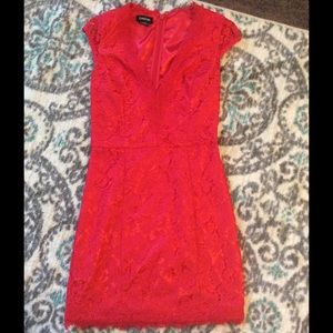 Red lace mini dress. By Bebe