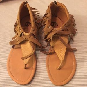 Tan size 7 1/2 sandals with fringe