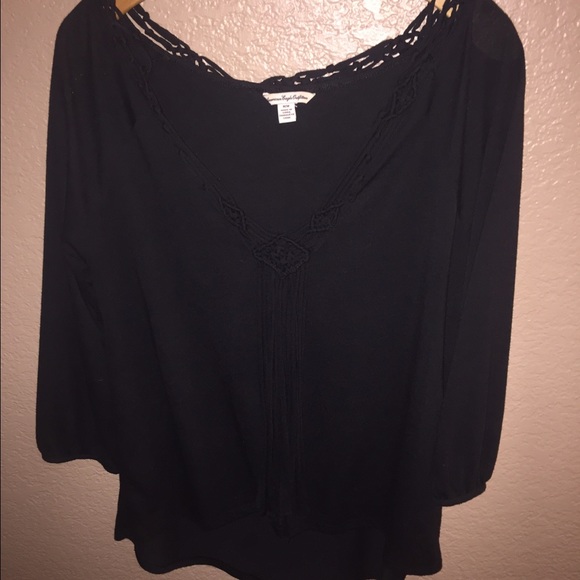 blouse with tassel detailing