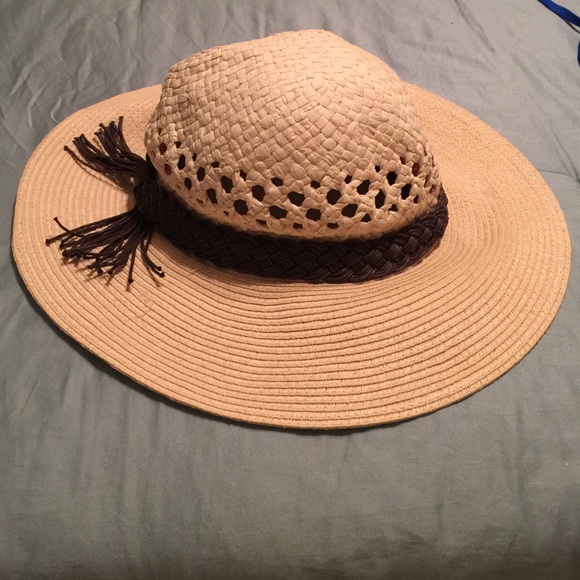 Floppy straw hat.