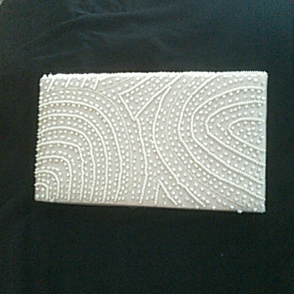 Beautifully beaded cream clutch