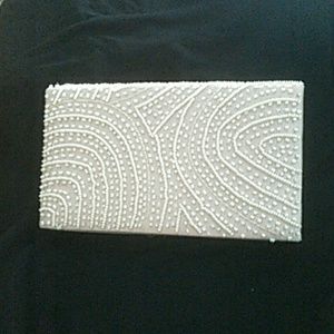 Beautifully beaded cream clutch