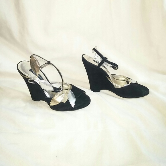 Smooth suede upper. Metallic floral detail accents