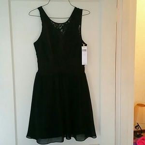 BCBG NWT  size 8 black dress with lace upper bust