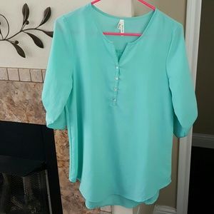 Sheer turquoise shirt