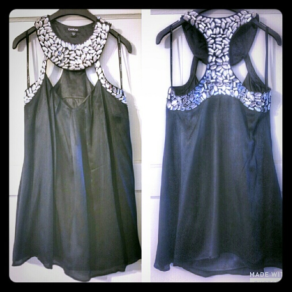 BeBe black mini dress with gems on neckline.