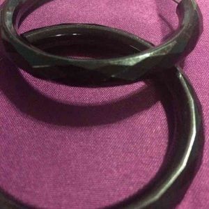 Black hoop earrings and white hoop earrings set.