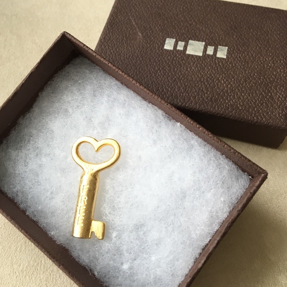 Museum shop artistic heart shaped key pendant