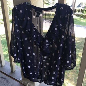 Navy polka dot top.