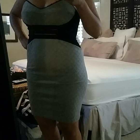 New bebe dress. No tags. Never worn. Very cute!