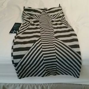 Brand new! Bebe strapless stripe dress. Very soft