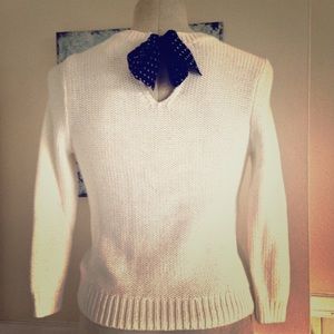 White sweater with bow