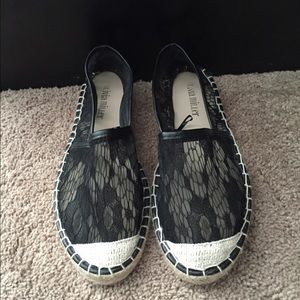 Black lace espadrilles.