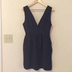 Black dress with plunging neckline