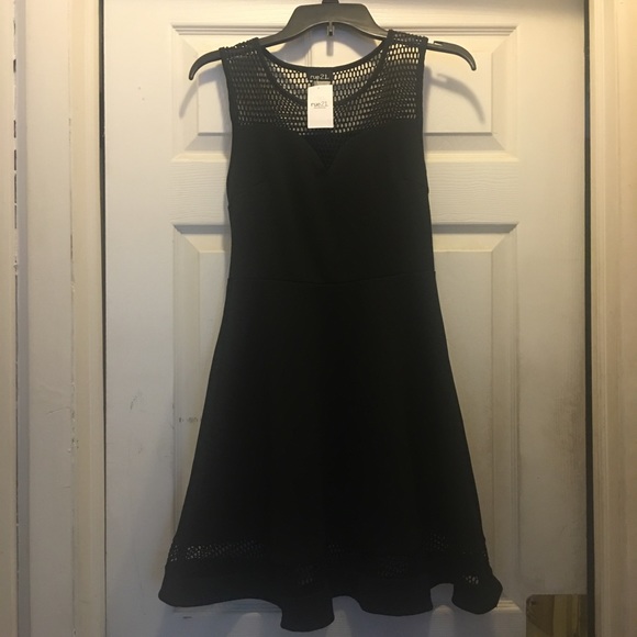 Brand new black dress with mesh openings - Picture 1 of 4