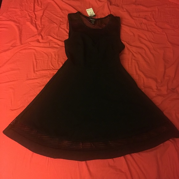 Brand new black dress with mesh openings - Picture 2 of 4