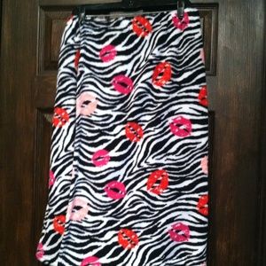 Wrap around after shower towel with Velcro.