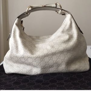 Off-white Gucci leather hobo in great condition.