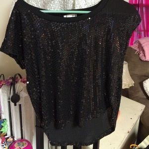 Black sequence shirt off one shoulder