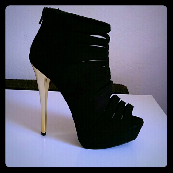 Black and gold heels