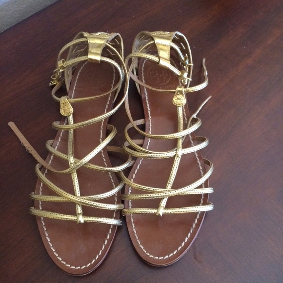 Gold sandals. I wear an 8.5 but these fit better