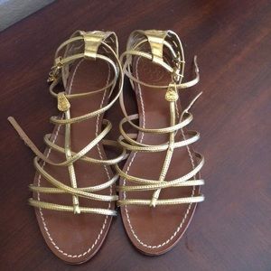 Gold sandals. I wear an 8.5 but these fit better