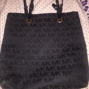 A Black Micheal Kors tote