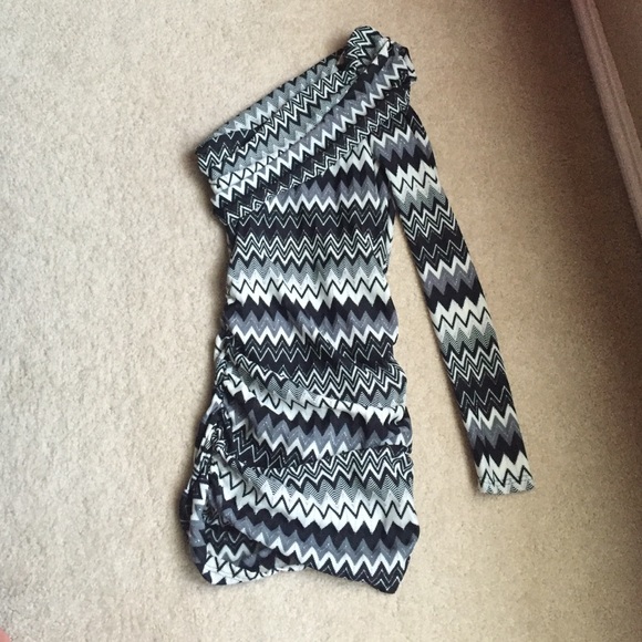 One sleeve, body con dress from Arden. B