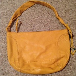 The Sak yellow leather hobo bag