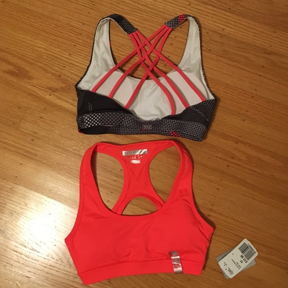 Two NWT F21 sports bra sz xs. Criss cross back.