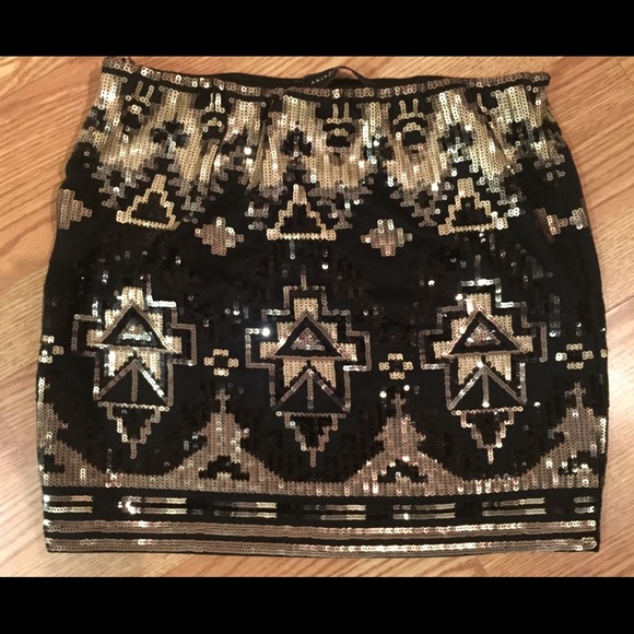 Akira black and gold sequin skit