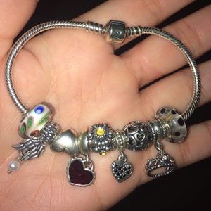 Pandora bracelet with 9 charms!