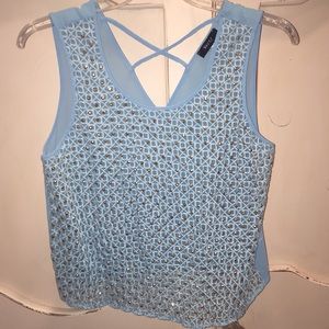 Light blue sheer boutique top. Size Medium.