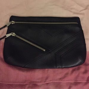 Barely used designer black leather clutch