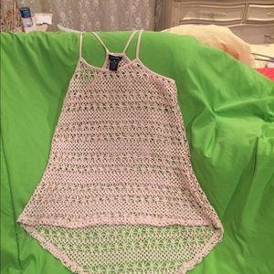 See through knitted tank top. Sz: Medium
