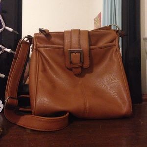 Tan cross body purse satchel