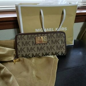 Sold somewhere Kors wallet