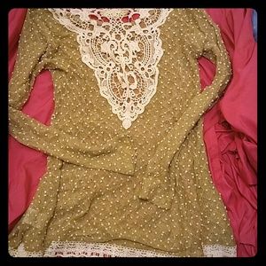 A cut out design in lace and fringe Top/Tunic