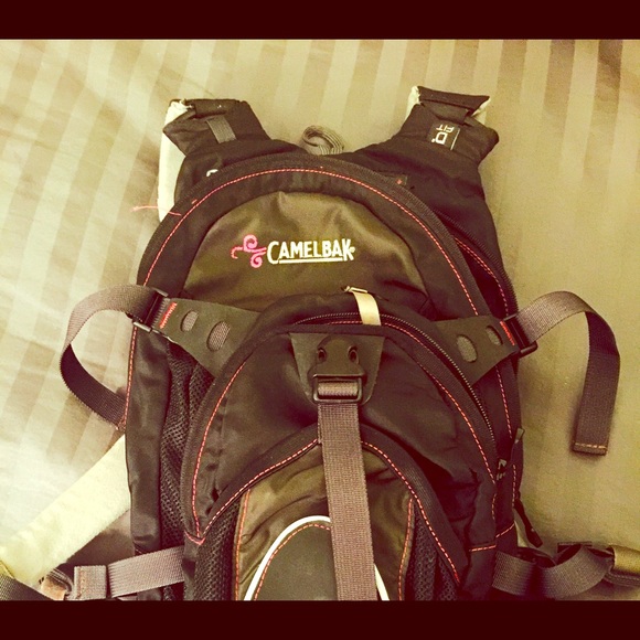 Pink and black camelbak backpack