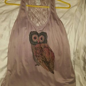 Brown tank with owl