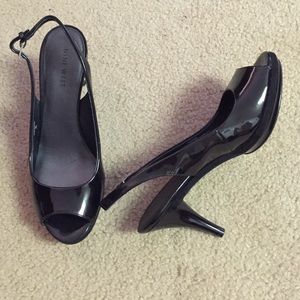 Black heels, never worn
