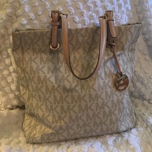 Signature Jet Set North South Tote PVC